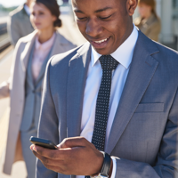 man looking down at his smartphone